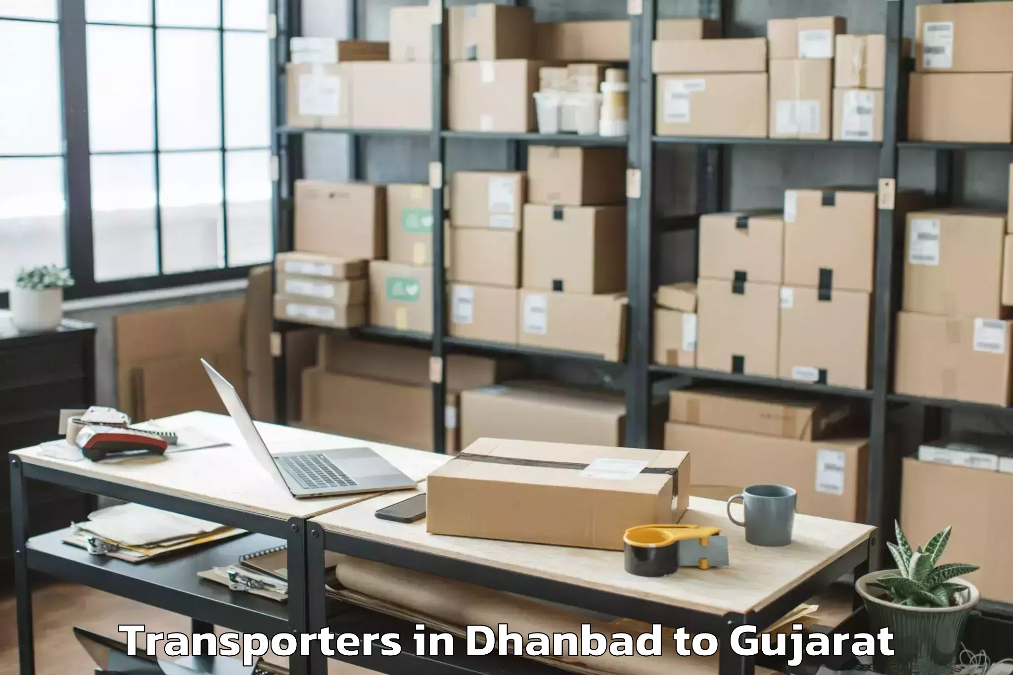 Top Dhanbad to Kapadvanj Transporters Available